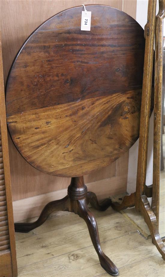 A late George II mahogany circular snap-top table with revolving top, birdcage support on column H.69cm Diam. 72